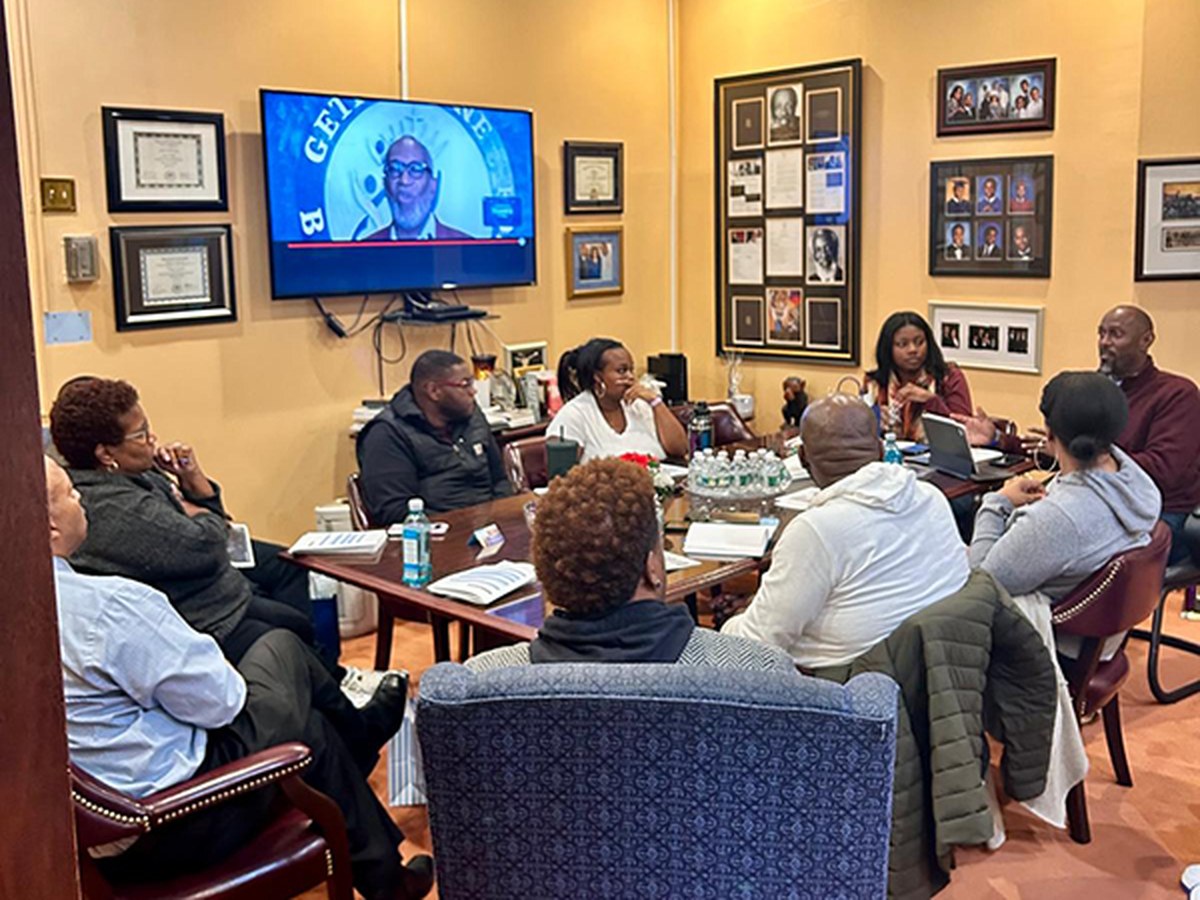 Envision Media leading a strategy session with clients around a boardroom table
